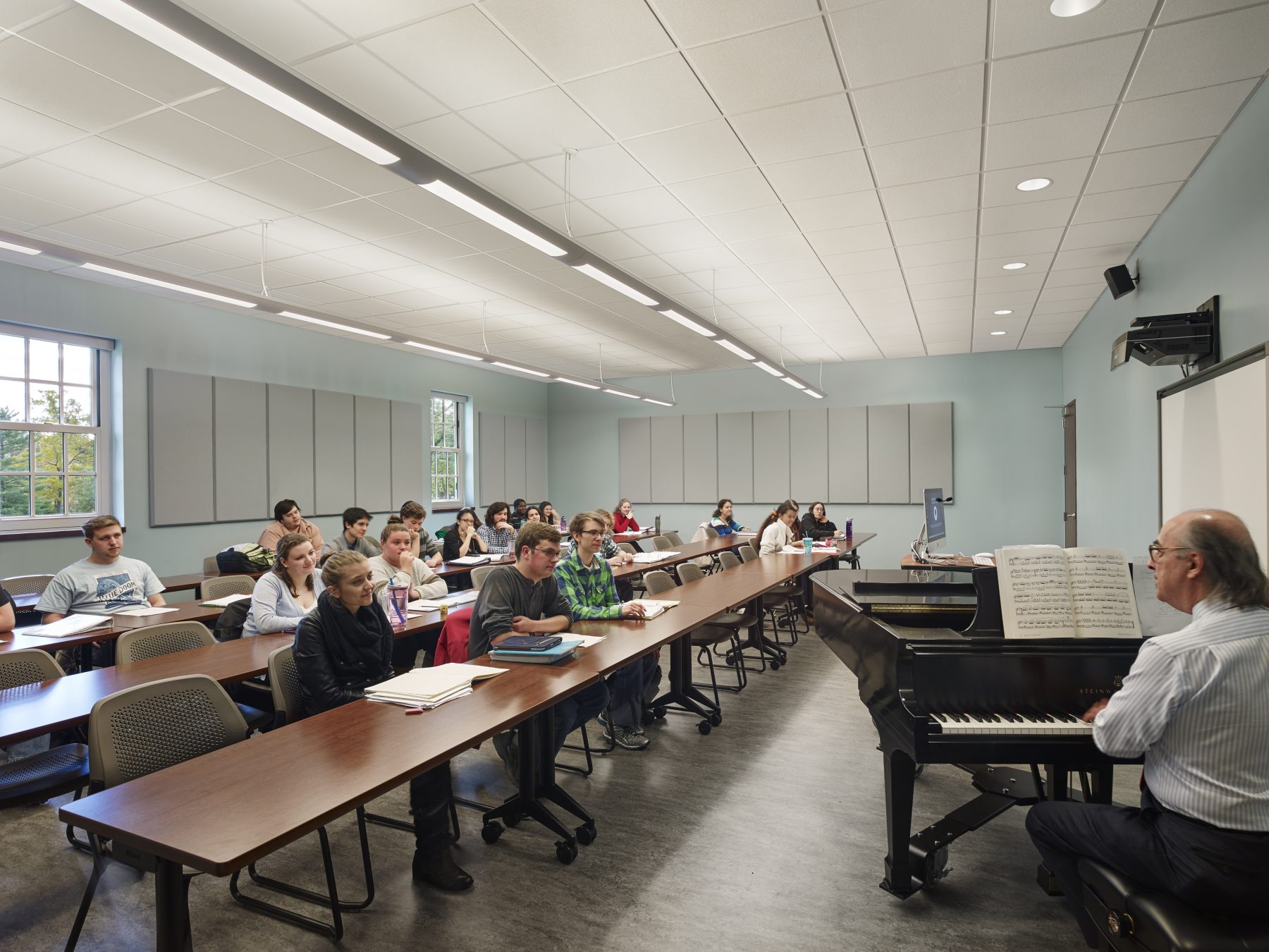 Westminster Choir College Band Classroom, the professor plays piano to the class