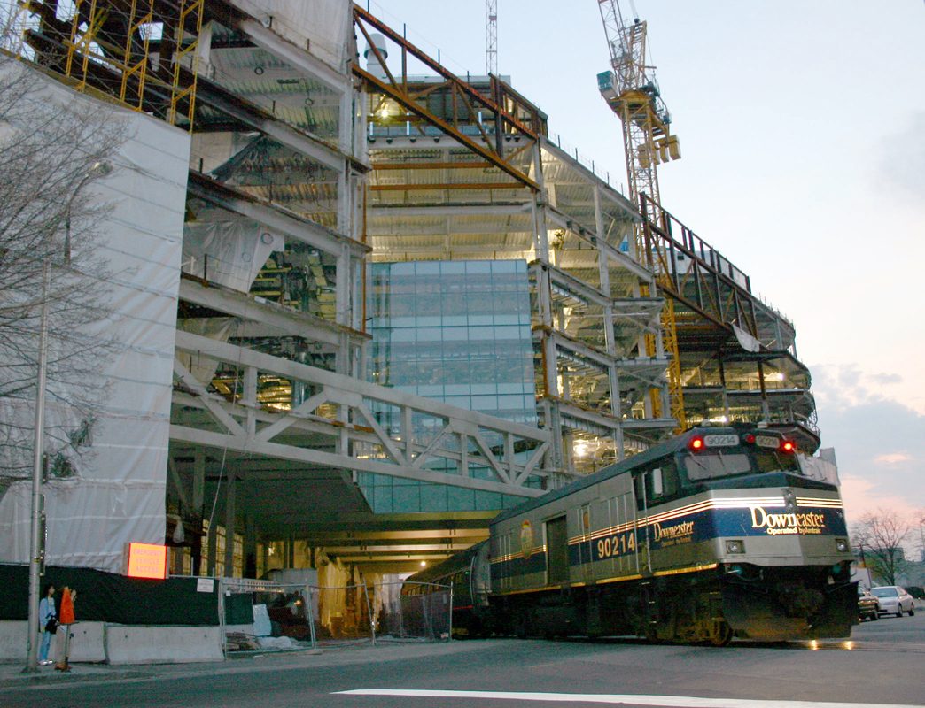 Mit Brain Cognitive Science Exterior with a train running through it