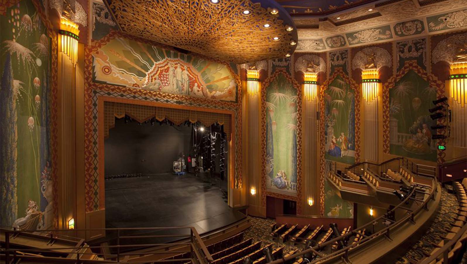 Paramount Center Theater, art murals decorate the walls and ceilings