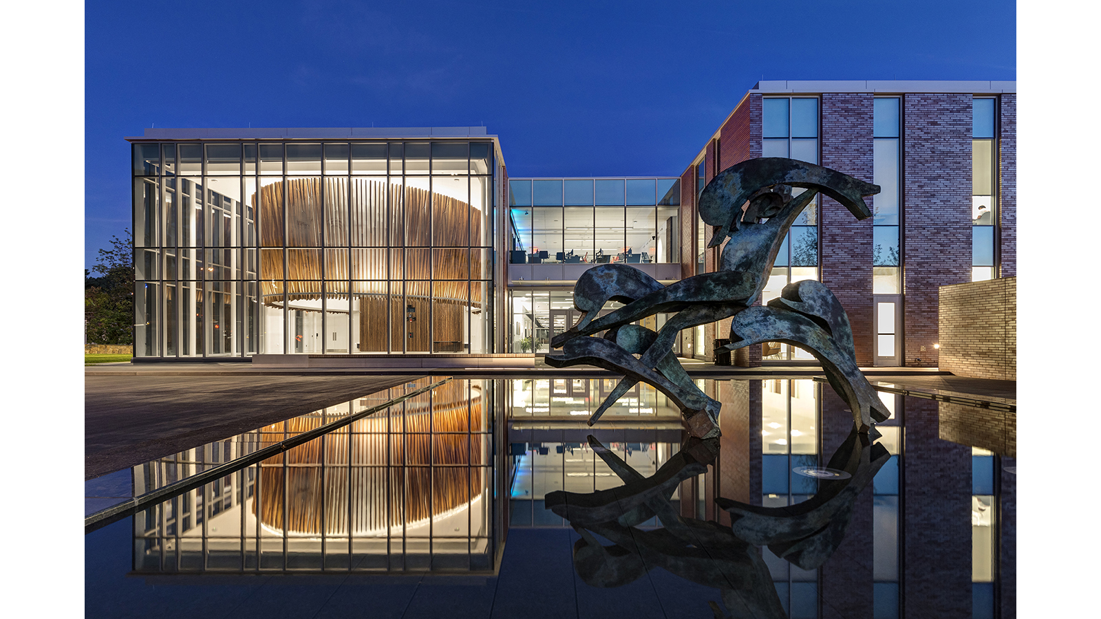 Sacred Heart Martire Center Exterior, an abstract art sculpture in front of the building