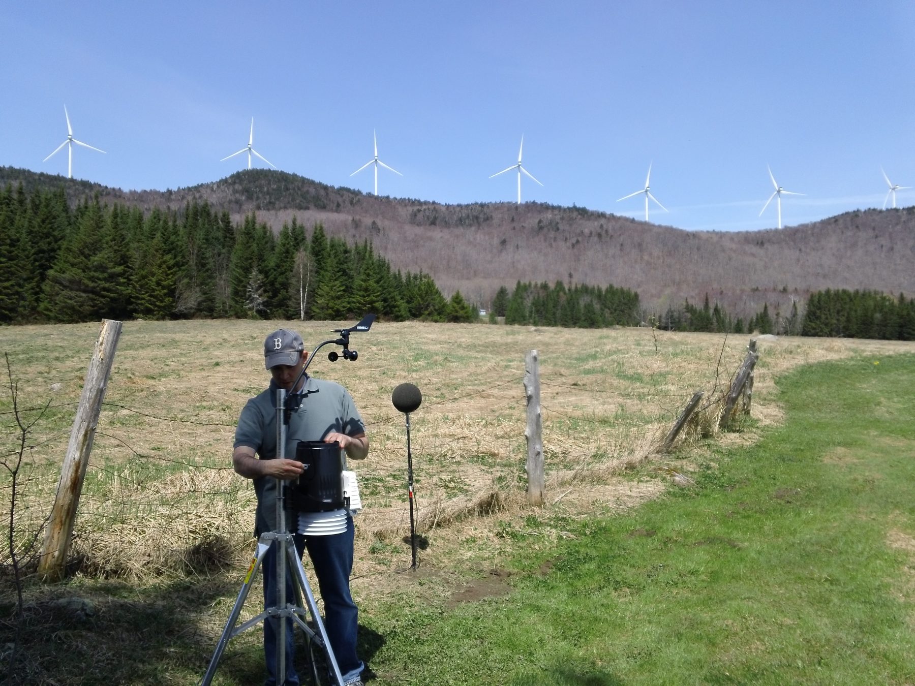 Vt Dept Public Services Wind Farm, 7 wind turbines are on a hill in the distance