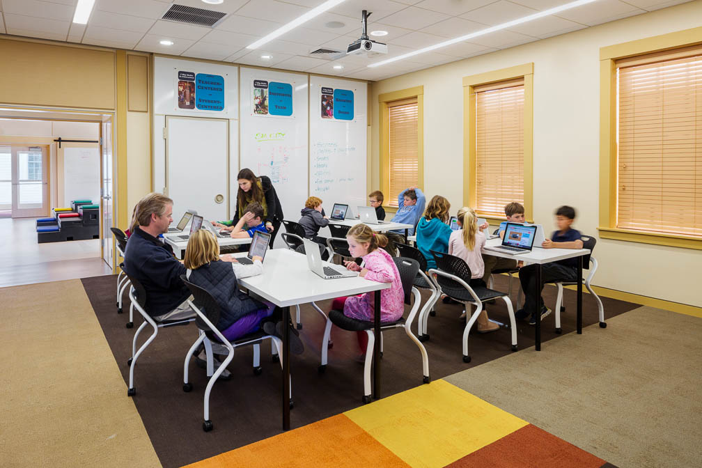 Derby Academy Innovation Center classroom, students use laptops at their desks