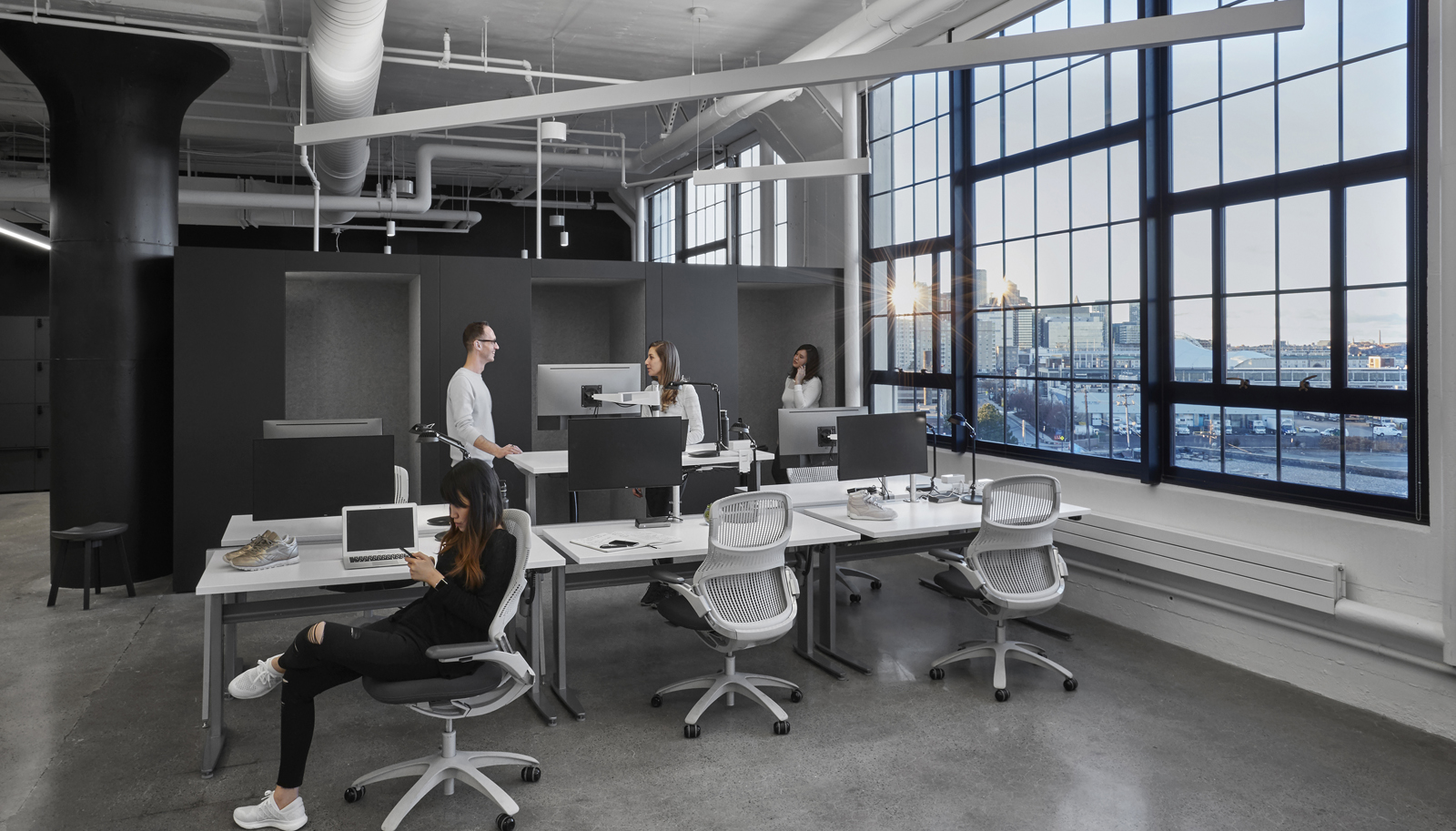 Reebok Headquarters Boston Interior, workstations with privacy rooms