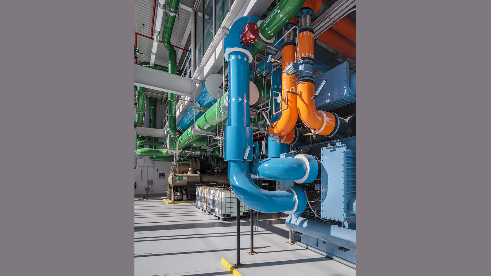 Tufts University Central Energy Plant Interior, blue, green, and orange pipes