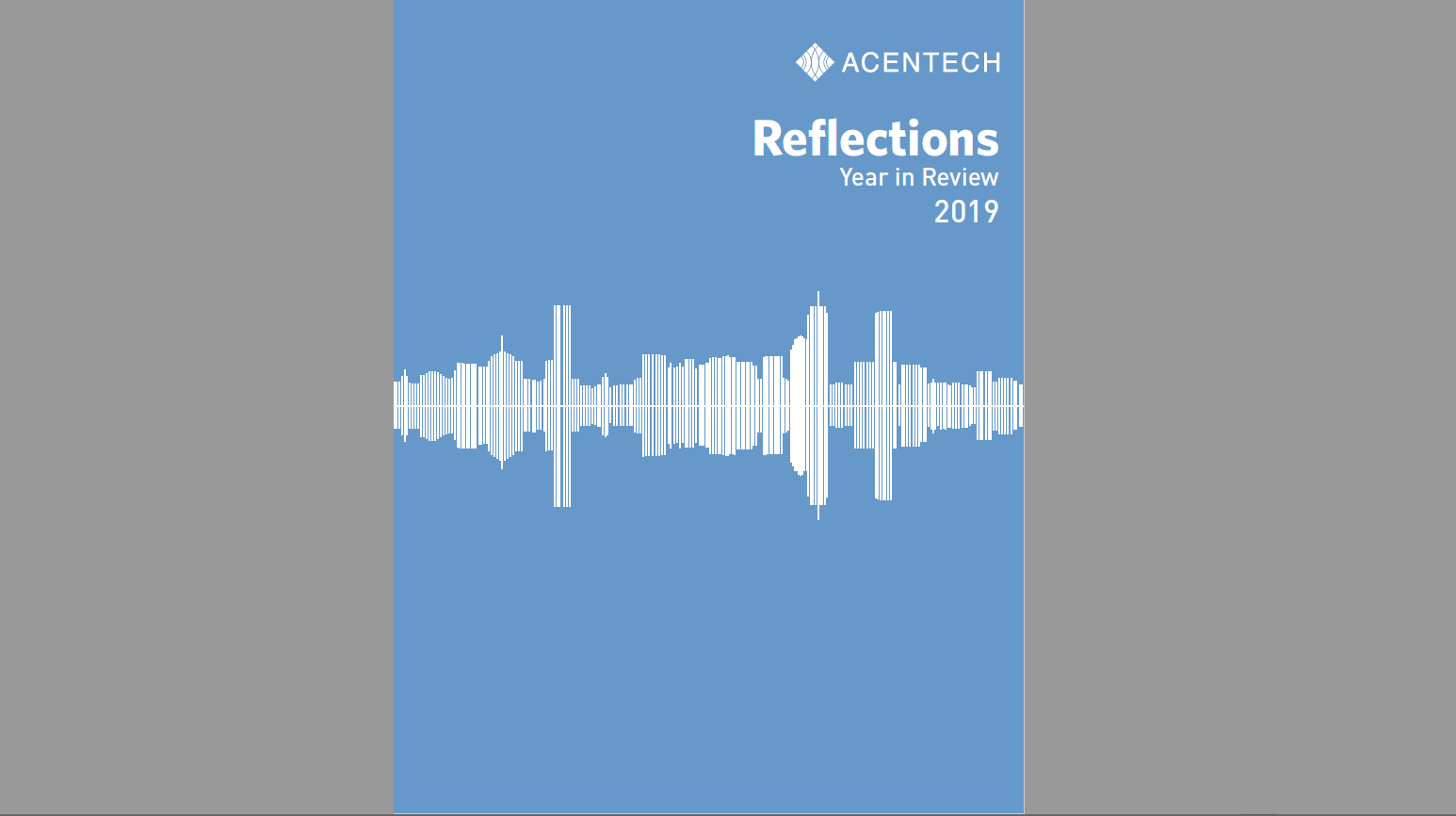 A blue yearbook cover with a sound vibration wave across the center middle. With the "Acentech" logo in the top right hand corner, followed by "Reflections"