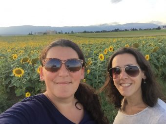 Viviane with daughter in sunflower field