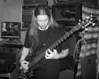 Jay Bliefnick playing a carvin electric guitar