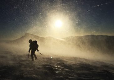 Andy Hiking on snowy peak