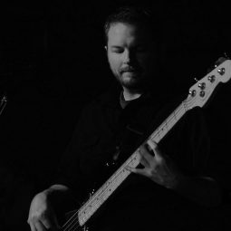 Ken Bourinot playing the guitar