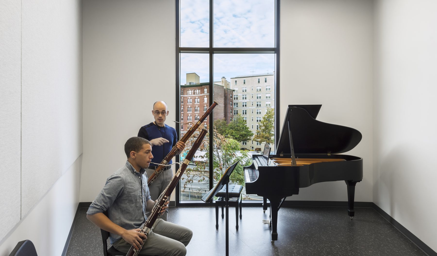 Boston Conservatory practice room with two men playing the oboe
