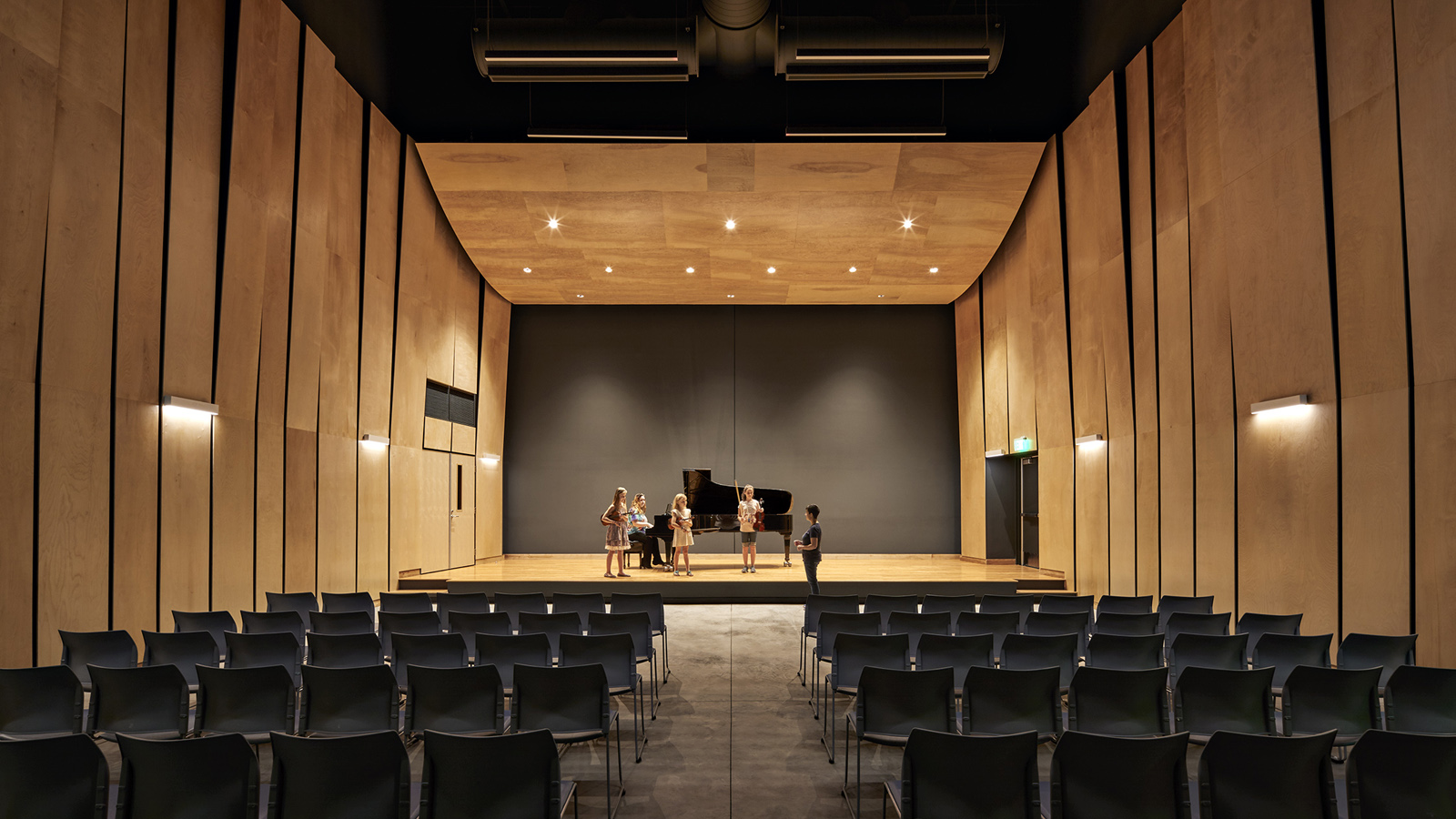 Brattleboro Music Center stage, students perform piano and violin