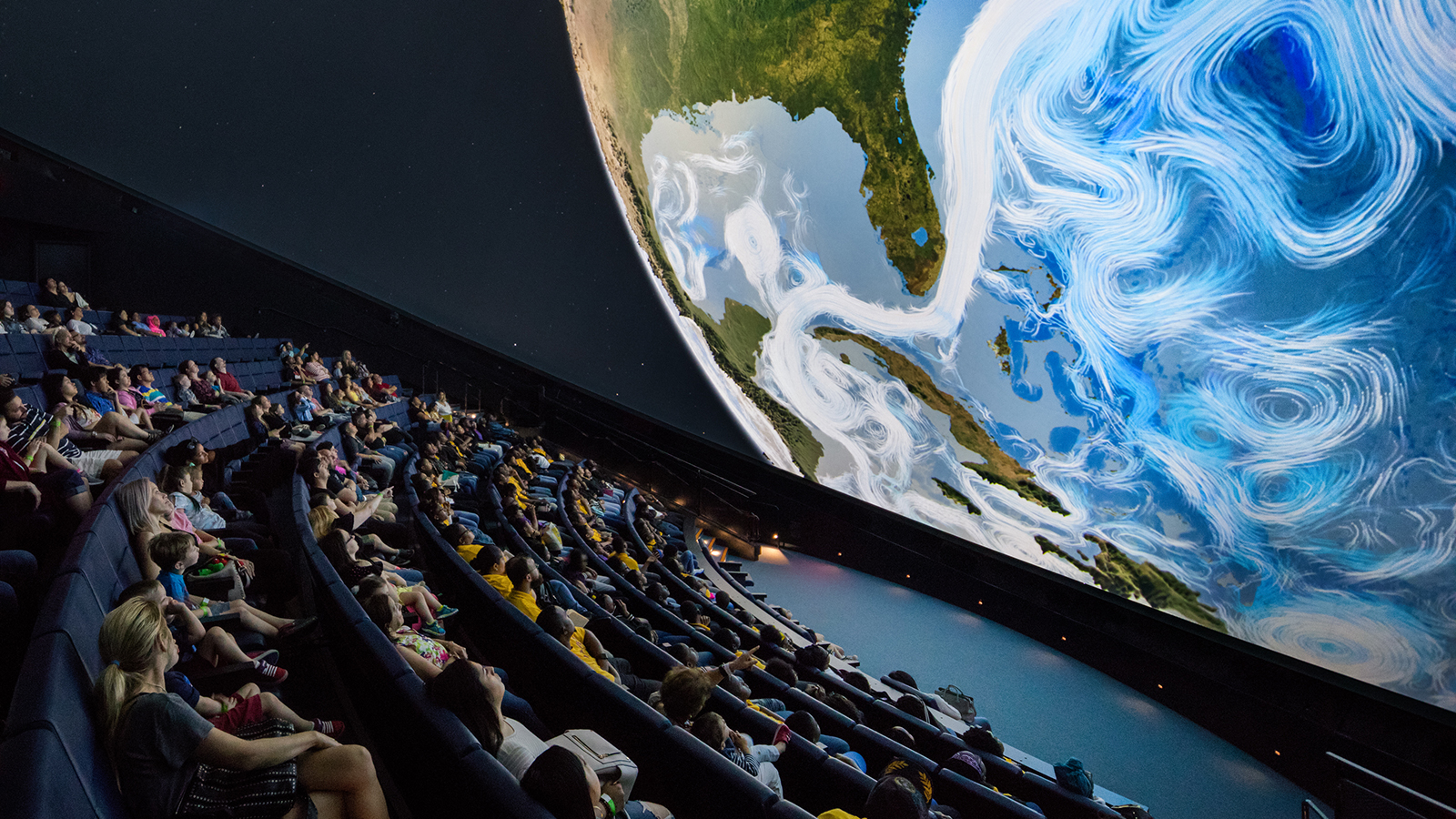 Grimshaw Frost Museum, astronomy theater, guests view a high resolution image of the earth