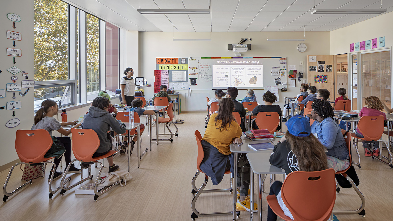 King Open School, classroom with projector and orange seats