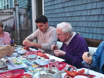 Jack Briskiee Eating Lobster with his Family