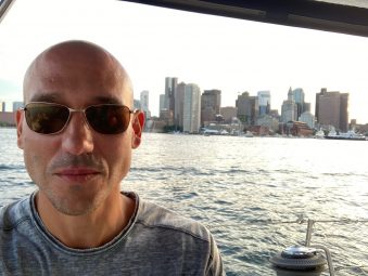 Roberto on a boat in Boston harbor.