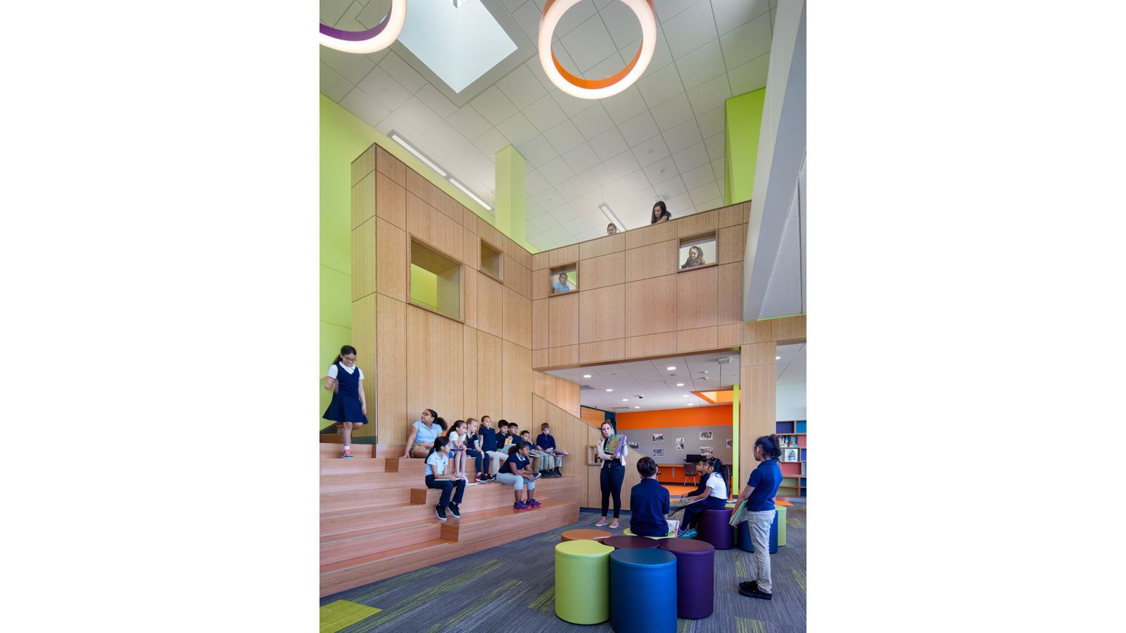 Irwin Jacobs Elementary School Interior, atrium/lobby with children sitting on stairs