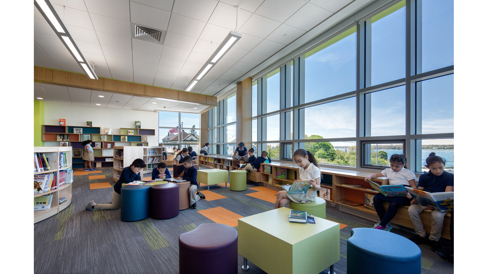 Irwin Jacobs Elementary School Interior, students enjoy the library, which overlooks the river