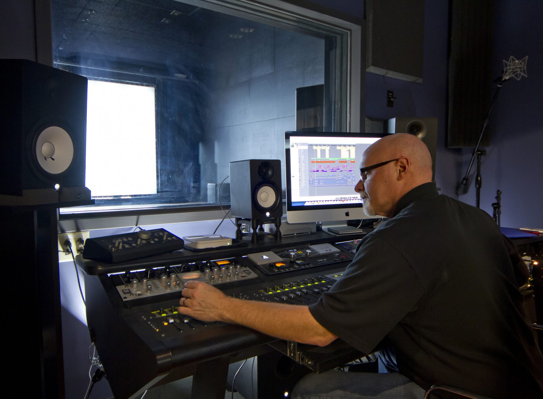 Umaine Wyeth Art Center Sound Lab, a man using an audio mixer