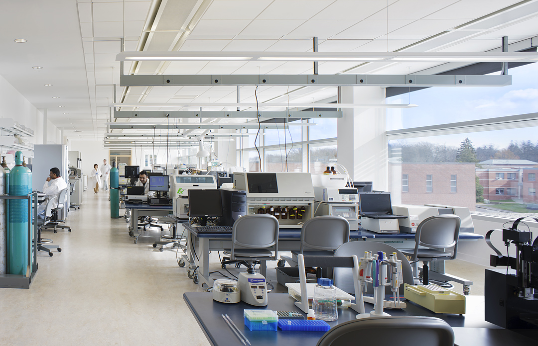 University of Rhode Island College Of Pharmacy Lab, equipment and desks litter the room