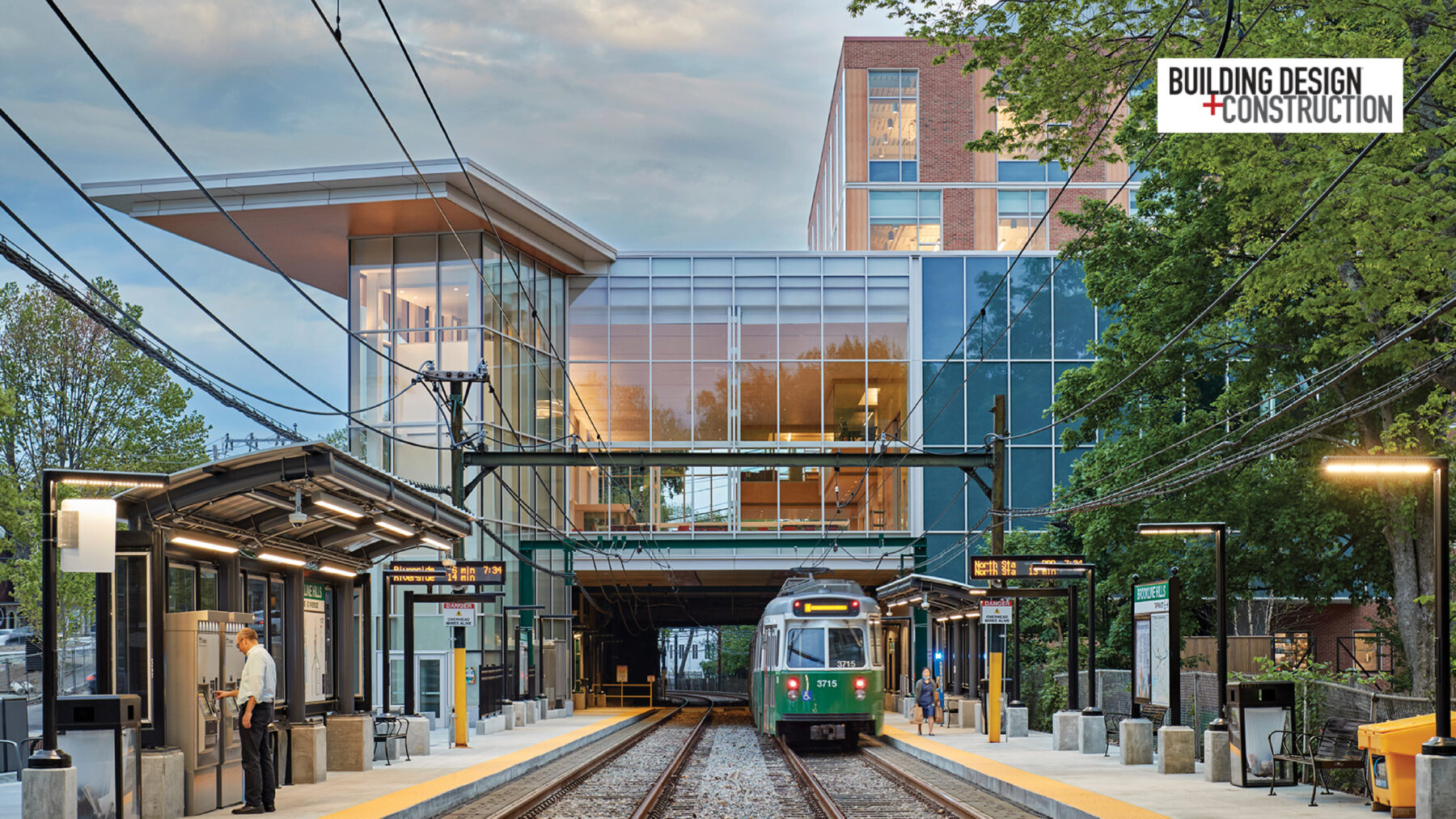 Brookline High School with train running through building